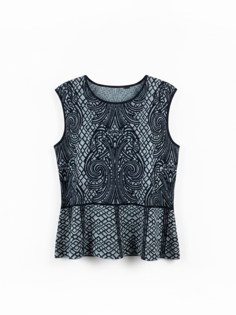 BCBGMaxAzria  Size 10/12 Blue geometric jacquard knit pattern. Flared bottom